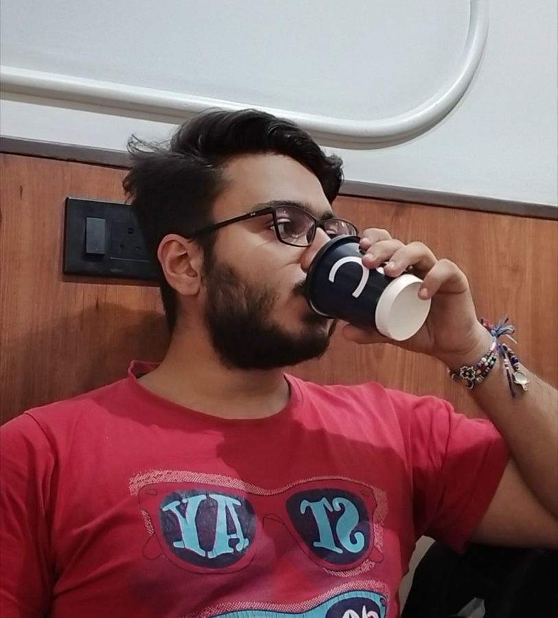 Abhishek Paatni, founder of Pour, drinking a coffee